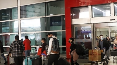 Indian students return from Ukraine following advisories from the Indian embassy amid growing tension between Russia and Ukraine, at Indira Gandhi International Airport, in New Delhi on Thursday. (ANI PHOTO) Indian students return from Ukraine following advisories from the Indian embassy amid growing tension between Russia and Ukraine, at Indira Gandhi International Airport, in New Delhi on Thursday. (ANI PHOTO)