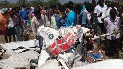 Telangana chopper crash: Locals have gathered to the spot where the chopper crashed closer to Nagarjunasagar dam on the Krishna river. Telangana chopper crash: Locals have gathered to the spot where the chopper crashed closer to Nagarjunasagar dam on the Krishna river. 
