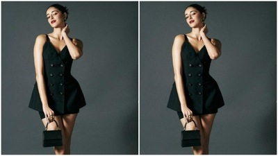 Ananya's top came with button details in the middle and pockets on both sides. She further accessorised her look with black heels and short black stockings. (Instagram/@ananyapanday)