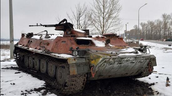 A destroyed Russian military vehicle is seen on the roadside on the outskirts of Kharkiv, Ukraine on Saturday. (AFP)