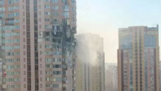 A screengrab from a video shows a damaged multi-storey residential building in an aftermath of shelling, after Russia launched a massive military operation against Ukraine, in south-west of Kyiv.