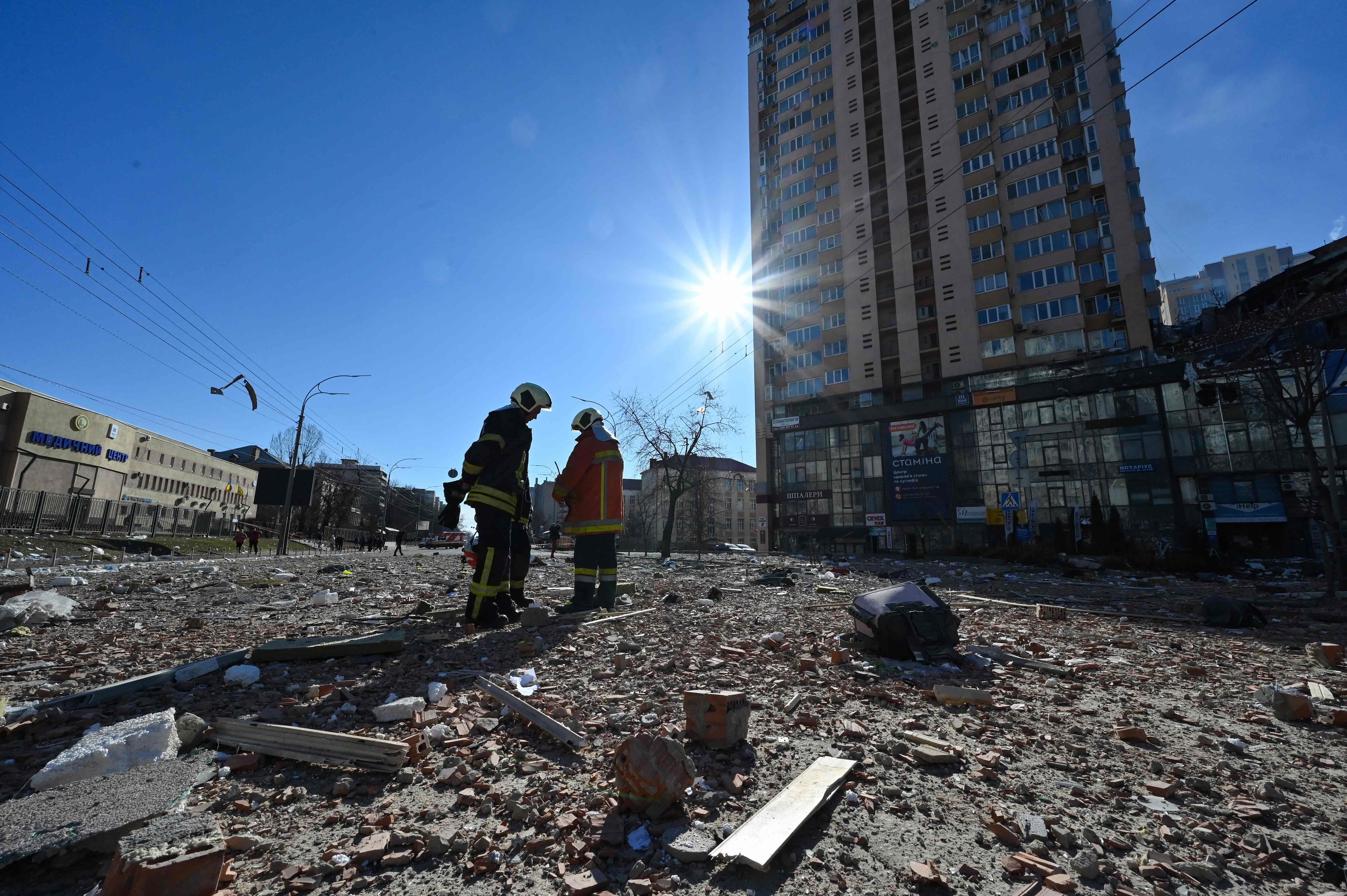  Firefighters work by a high-rise apartment block which was hit by recent shelling in Kyiv on Saturday. (AFP) Firefighters work by a high-rise apartment block which was hit by recent shelling in Kyiv on Saturday. (AFP)