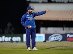 India's captain Rohit Sharma places his fielders during the second Twenty20 international cricket match between India and Sri Lanka, in Dharmsala, India, Saturday, Feb. 26, 2022. (AP Photo/Ashwini Bhatia)