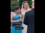 The Instagram video shows the girl handing her adoption papers to her mom's husband-to-be at their wedding.(instagram/@tjdukesfilms) The Instagram video shows the girl handing her adoption papers to her mom's husband-to-be at their wedding.(instagram/@tjdukesfilms)