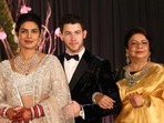 Priyanka Chopra and Nick Jonas with her mother during their wedding reception in Delhi in 2018. Priyanka Chopra and Nick Jonas with her mother during their wedding reception in Delhi in 2018.