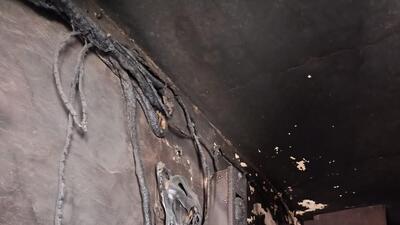 The damaged wiring and walls of the garment store where a fire broke out on Saturday night. (HT Photo)