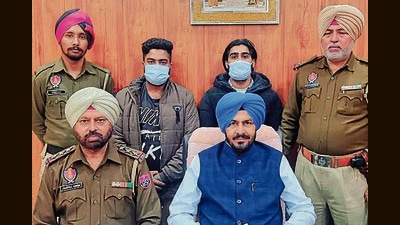 The two Zira men, accused of drug peddling, were held with 1.29kg heroin in Ludhiana. (HT PHOTO) The two Zira men, accused of drug peddling, were held with 1.29kg heroin in Ludhiana. (HT PHOTO)