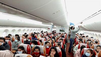 Indian nationals board a special Air India flight, evacuating Indians from war-torn Ukraine, in Bucharest. (PTI) Indian nationals board a special Air India flight, evacuating Indians from war-torn Ukraine, in Bucharest. (PTI)