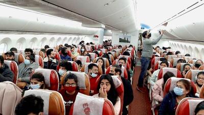 Indian nationals board a special Air India flight, evacuating Indians from war-torn Ukraine, in Bucharest on Sunday. (PTI) Indian nationals board a special Air India flight, evacuating Indians from war-torn Ukraine, in Bucharest on Sunday. (PTI)