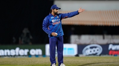 India's captain Rohit Sharma places his fielders during the second Twenty20 international cricket match between India and Sri Lanka, in Dharmsala, India, Saturday, Feb. 26, 2022. (AP Photo/Ashwini Bhatia) (AP) India's captain Rohit Sharma places his fielders during the second Twenty20 international cricket match between India and Sri Lanka, in Dharmsala, India, Saturday, Feb. 26, 2022. (AP Photo/Ashwini Bhatia) (AP)