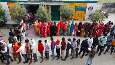 People stand in queue to cast their votes during the fifth phase of Uttar Pradesh state legislature elections, in Patel Nagar, Dubepur Sultanpur district, Uttar Pradesh. (AP) People stand in queue to cast their votes during the fifth phase of Uttar Pradesh state legislature elections, in Patel Nagar, Dubepur Sultanpur district, Uttar Pradesh. (AP)