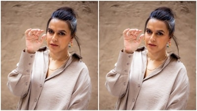 Assisted by makeup artist Aafreen, Neha chose to go minimal on the makeup to complement her attire for the day. In nude eyeshadow, mascara-laden eyelashes, drawn eyebrows, contoured cheeks and a shade of nude lipstick, Neha looked ravishing as ever. (Instagram/@nehadhupia)