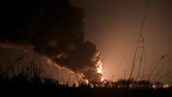 A view shows a burning oil depot reportedly hit by shelling near the military airbase Vasylkiv in the Kyiv region, Ukraine.(Reuters)