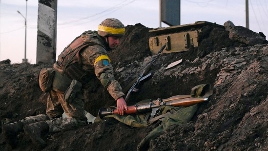 A Ukrainian serviceman holds a rocket-propelled grenade (RPG) launcher at fighting positions outside the city of Kharkiv, Ukraine.(REUTERS file)