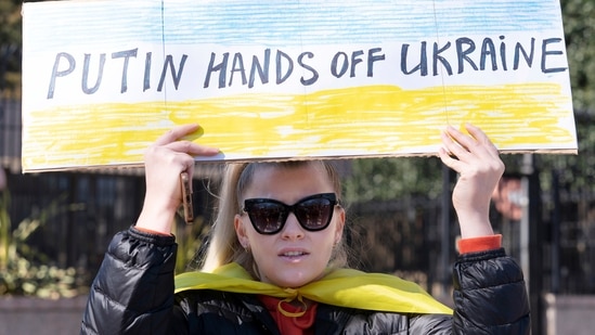 People protest the Russian invasion of Ukraine outside of the Russian Embassy in Washington, Sunday, Feb. 27, 2022.&nbsp;(AP)