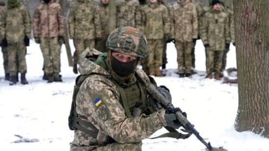 Dozens of civilians have been joining Ukraine's army reserves in recent weeks amid fears about Russian invasion.(AP)