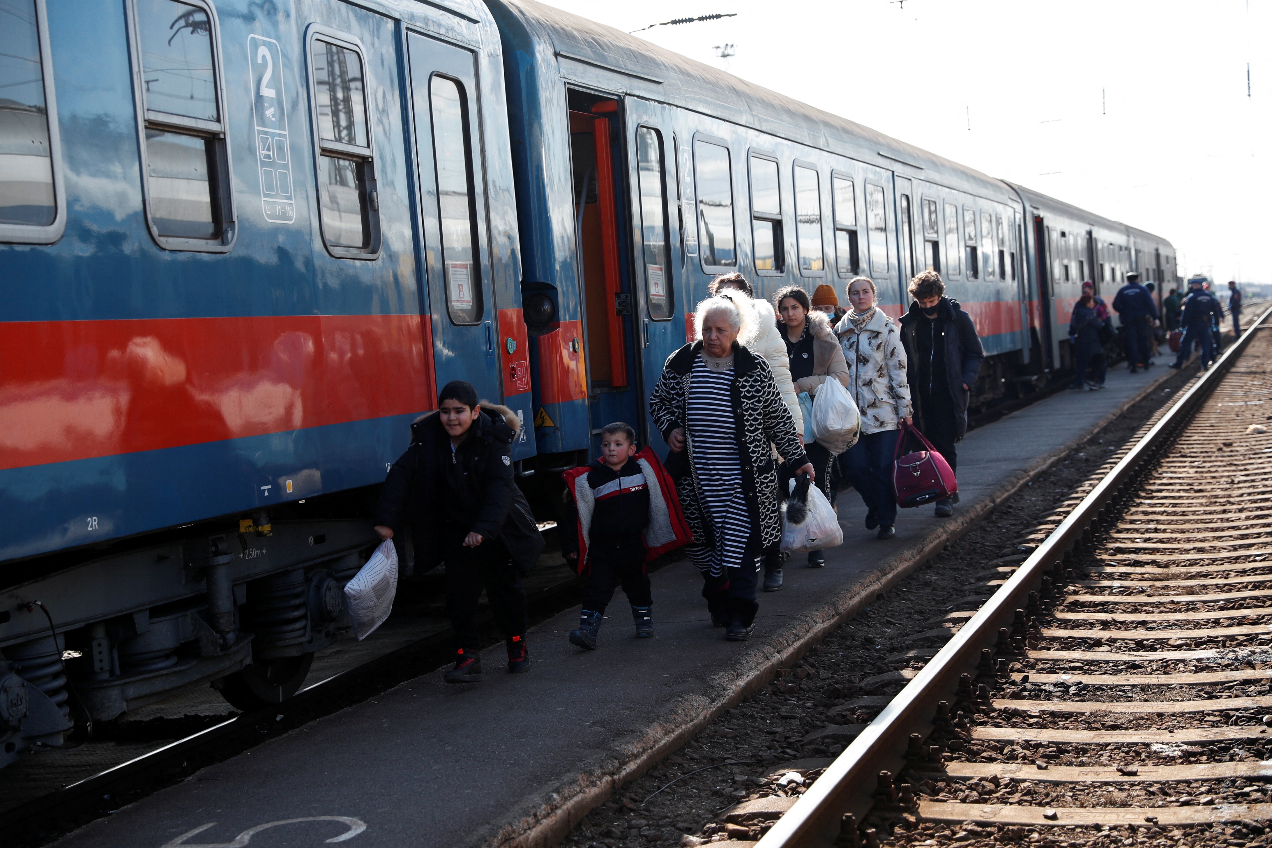 People fleeing from Ukraine to Hungary arrive at the train station in Zahony, Hungary. (REUTERS)
