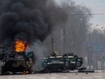 A Russian armored personnel carrier burns after fighting in Kharkiv, Ukraine, Sunday, Feb. 27, 2022. AP/PTI(AP02_28_2022_000013A)(AP) A Russian armored personnel carrier burns after fighting in Kharkiv, Ukraine, Sunday, Feb. 27, 2022. AP/PTI(AP02_28_2022_000013A)(AP)