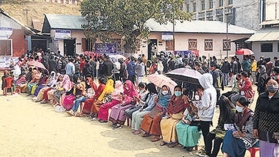 Voters outside a polling booth in Chingmeirong, in Imphal East during the Manipur election on Monday. (ANI) Voters outside a polling booth in Chingmeirong, in Imphal East during the Manipur election on Monday. (ANI)