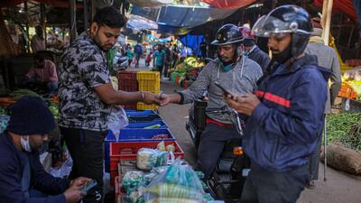 India’s economy grew a moderate 5.4% in the October-December quarter, when the country was grappling with the Omicron wave, against 8.5% in the previous quarter, data released by National Statistical Office on Monday indicated. (BLOOMBERG PHOTO.) India’s economy grew a moderate 5.4% in the October-December quarter, when the country was grappling with the Omicron wave, against 8.5% in the previous quarter, data released by National Statistical Office on Monday indicated. (BLOOMBERG PHOTO.)