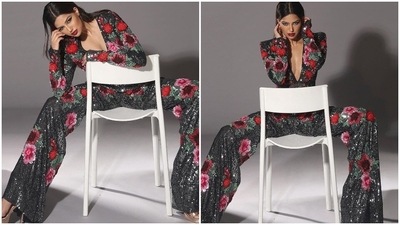 Harnaaz Sandhu, the 70th Miss Universe, recently took to her Instagram handle to treat her fans with stunning stills of herself in a dazzling black floral jumpsuit by Naeem Khan. (Instagram/@harnaazsandhu_03) Harnaaz Sandhu, the 70th Miss Universe, recently took to her Instagram handle to treat her fans with stunning stills of herself in a dazzling black floral jumpsuit by Naeem Khan. (Instagram/@harnaazsandhu_03)