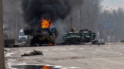 A Russian armored personnel carrier burns after fighting in Kharkiv, Ukraine, Sunday, Feb. 27, 2022. AP/PTI(AP02_28_2022_000013A) (AP) A Russian armored personnel carrier burns after fighting in Kharkiv, Ukraine, Sunday, Feb. 27, 2022. AP/PTI(AP02_28_2022_000013A) (AP)