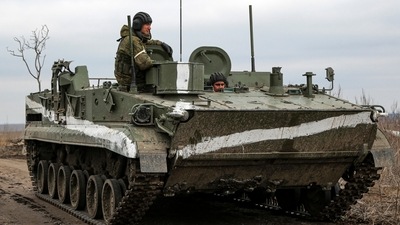 Russia Ukraine Conflict Live: An armored vehicle rolls outside Mykolaivka, Donetsk region, the territory controlled by pro-Russian militants, in eastern Ukraine, (AP) Russia Ukraine Conflict Live: An armored vehicle rolls outside Mykolaivka, Donetsk region, the territory controlled by pro-Russian militants, in eastern Ukraine, (AP)
