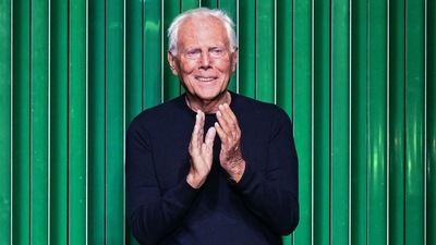 Italian fashion designer Giorgio Armani acknowledges the public after his catwalk show for the Fall/Winter 2022/2023 collection on the sixth day of the Milan Fashion Week. (AFP) Italian fashion designer Giorgio Armani acknowledges the public after his catwalk show for the Fall/Winter 2022/2023 collection on the sixth day of the Milan Fashion Week. (AFP)