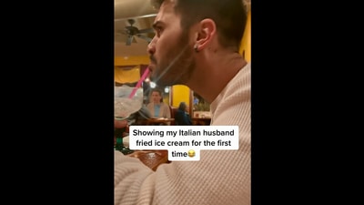 The image, taken from the Instagram video, shows the man's reaction to hearing about fried ice cream. (Instagram/@carloandsarah)
