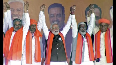 Prime Minister Narendra Modi with state BJP President Swatantra Dev Singh (2R) and others during a public meeting for the Uttar Pradesh Assembly elections, in Ballia on Monday. (ANI) Prime Minister Narendra Modi with state BJP President Swatantra Dev Singh (2R) and others during a public meeting for the Uttar Pradesh Assembly elections, in Ballia on Monday. (ANI)