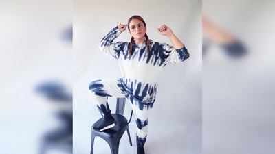 Huma Qureshi teamed her look with blue kicks and for accessories, she went for just a pair of cool vintage frames. (Instagram/@iamhumaq)