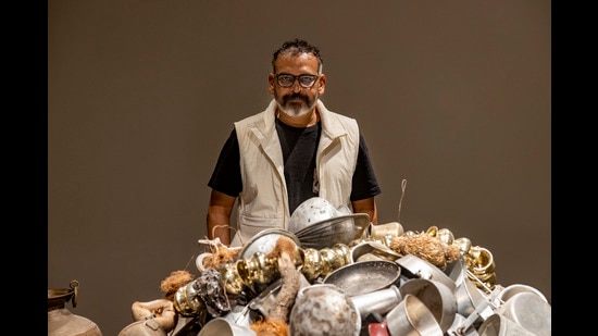 Subodh Gupta, and one of his recent sculptures named Self Portrait, 2022.