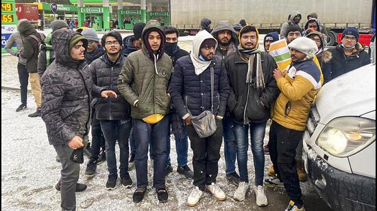 Indian students stuck in Shehyni, Lviv Oblast before crossing the Ukraine-Poland border. (PTI Photo)