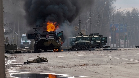 A Russian armored personnel carrier burns after fighting in Kharkiv, Ukraine, Sunday, Feb. 27, 2022. AP/PTI(AP02_28_2022_000013A)(AP)