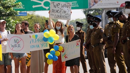 Ukrainian tourists staged an anti-war protest outside Russia's embassy in Sri Lanka on Monday.(AP)