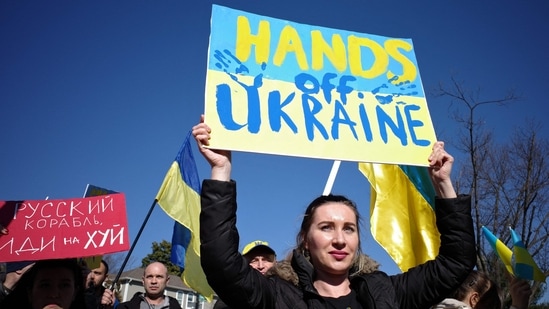 Demonstrators gather to protest Russia?s invasion of Ukraine outside the Russian Embassy in Washington, DC.(AFP)