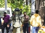 A member of the Gurugram Police bomb squad at Sector 31 of Gurugram where two live grenades were found in a house (HT Photo/Vipin Kumar) A member of the Gurugram Police bomb squad at Sector 31 of Gurugram where two live grenades were found in a house (HT Photo/Vipin Kumar)