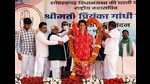 Congress General Secretary Priyanka Gandhi Vadra being felicitated with a garland during a public meeting for the Uttar Pradesh Assembly elections, at Shohratgarh, in Siddharthnagar on Tuesday. (AGENCY)