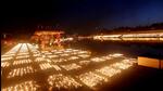 Earthen lamps lit up at the banks of the Kshipra river as part of the ‘Shiv Jyoti Arpanam Mahotsava’ on the occasion of Maha Shivaratri', in Ujjain on Tuesday. Ujjain created a Guinness record by lighting 11.71 lakh clay lamps. (ANI)