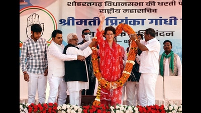 Congress General Secretary Priyanka Gandhi Vadra being felicitated with a garland during a public meeting for the Uttar Pradesh Assembly elections, at Shohratgarh, in Siddharthnagar on Tuesday. (AGENCY) Congress General Secretary Priyanka Gandhi Vadra being felicitated with a garland during a public meeting for the Uttar Pradesh Assembly elections, at Shohratgarh, in Siddharthnagar on Tuesday. (AGENCY)