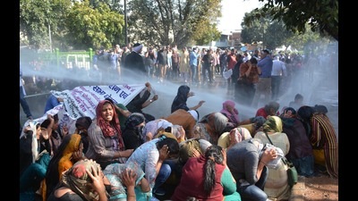 Police using water cannons against protesting teachers in Panchkula on Tuesday. (Sant Arora/HT) Police using water cannons against protesting teachers in Panchkula on Tuesday. (Sant Arora/HT)
