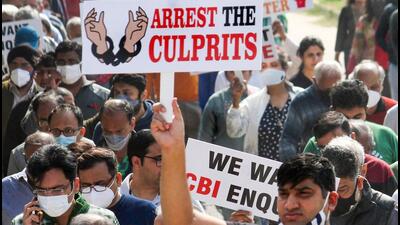 Residents of Chintels Paradiso housing society hold placards during a protest demanding a CBI investigation into the collapse last month in Gurugram. (PTI Archive) Residents of Chintels Paradiso housing society hold placards during a protest demanding a CBI investigation into the collapse last month in Gurugram. (PTI Archive)