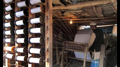 Weavers working in a handloom unit in Astarabad village of Sant Kabir Nagar. (Sourced)