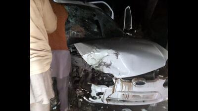 Mangled remains of the car that collided with another vehicle in Muktsar. (HT Photo)