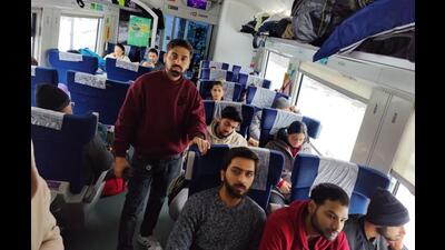 Indian students of Kharkiv National Medical University on board the special train that left the war-torn city in Ukraine for Lviv on the border with Poland on Tuesday morning. (HT Photo) Indian students of Kharkiv National Medical University on board the special train that left the war-torn city in Ukraine for Lviv on the border with Poland on Tuesday morning. (HT Photo)