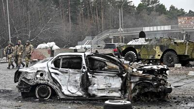 A view of the car which was destroyed by recent shelling on a check-point in the city of Brovary outside Kyiv on Tuesday. (AFP) A view of the car which was destroyed by recent shelling on a check-point in the city of Brovary outside Kyiv on Tuesday. (AFP)