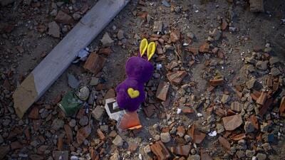 A toy among the debris near an apartment building damaged following a rocket attack, in Kyiv, Ukraine on Saturday. (AP) A toy among the debris near an apartment building damaged following a rocket attack, in Kyiv, Ukraine on Saturday. (AP)