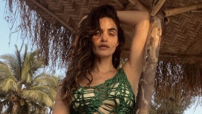 Gabriella Demetriades slays the ultimate beach babe look in cut-out dress and nude bikini set Gabriella Demetriades slays the ultimate beach babe look in cut-out dress and nude bikini set