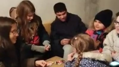 Children hidden in a bomb shelter and singing the Kyiv anthem. (Twitter- @MFA_Ukraine) Children hidden in a bomb shelter and singing the Kyiv anthem. (Twitter- @MFA_Ukraine)