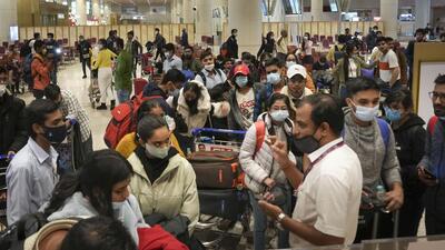Indian nationals, evacuated from crisis-hit Ukraine, upon their arrival at the airport in Mumbai on Tuesday. (PTI)